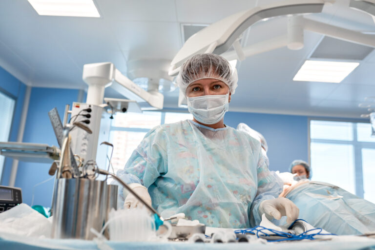 Medical team in surgical environment.