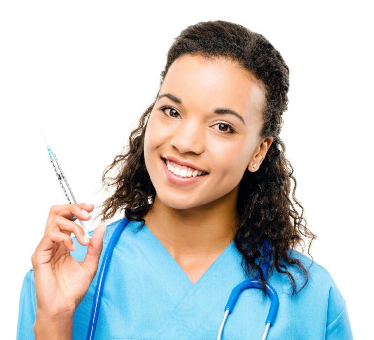 Healthcare professional holding a syringe.