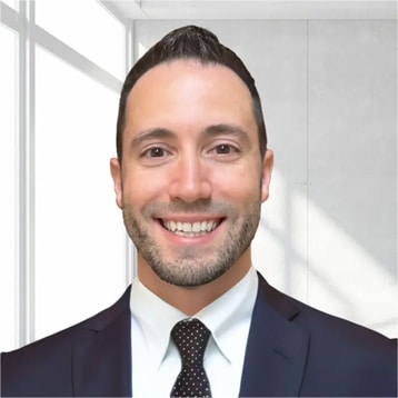 Man in suit, modern office background.